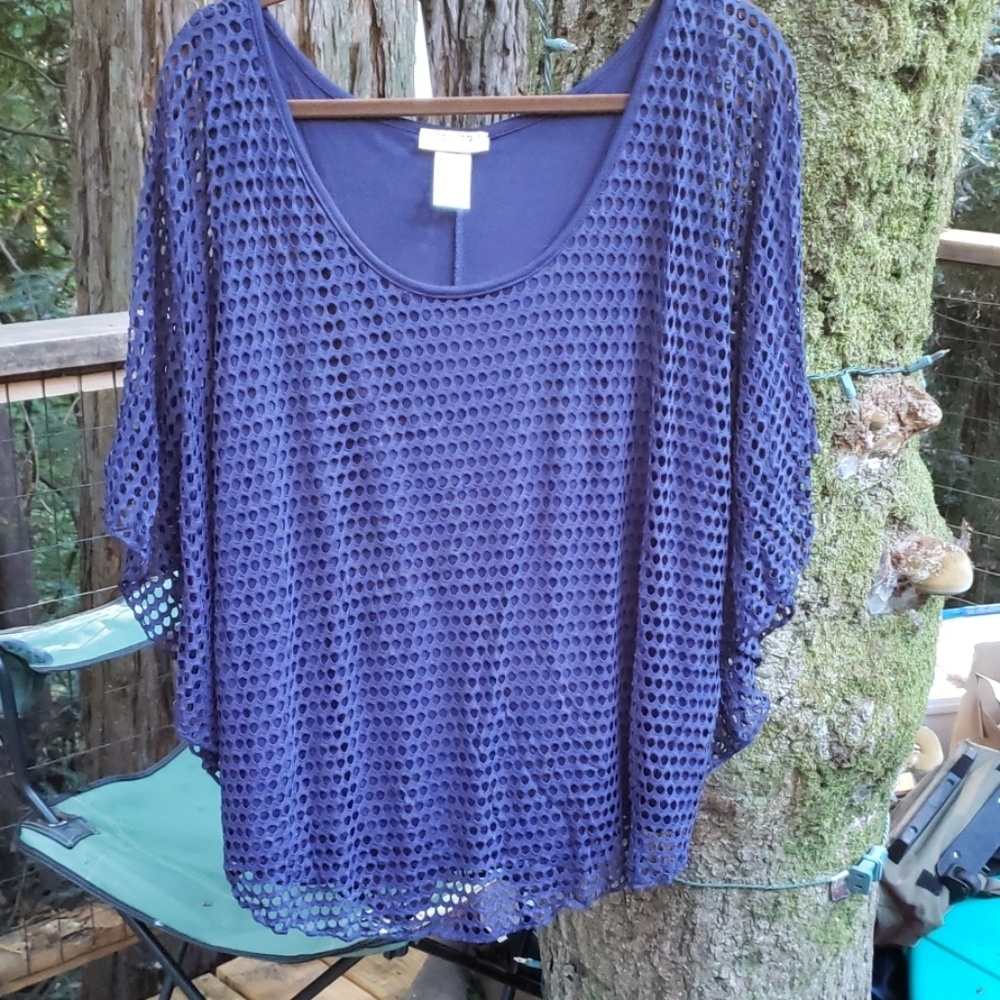 Attached tank and decorative over blouse.